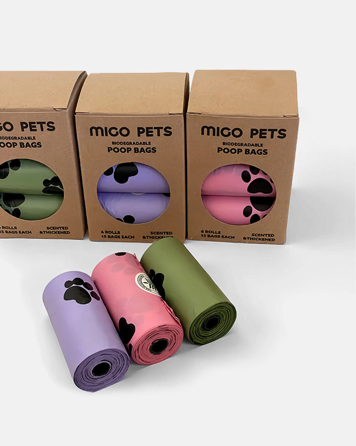 Overview of biodegradable dog poop bags, featuring eco-friendly packaging and rolls.