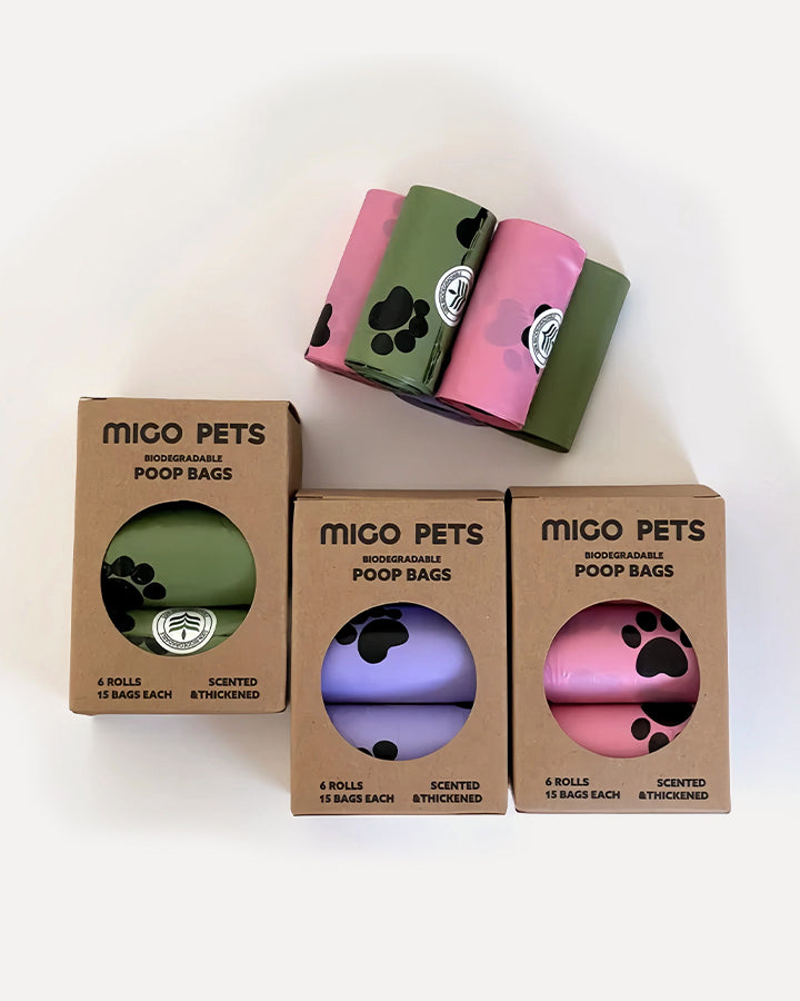 Overview of biodegradable dog poop bags, featuring eco-friendly packaging and rolls.