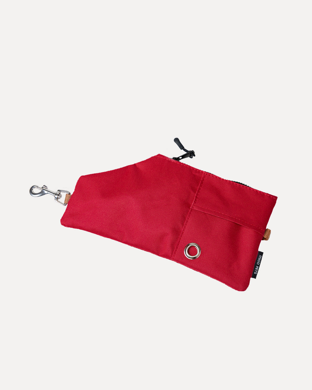 Overview of the durable and versatile crossbody travel pouch in crimson red, featuring its complete design.