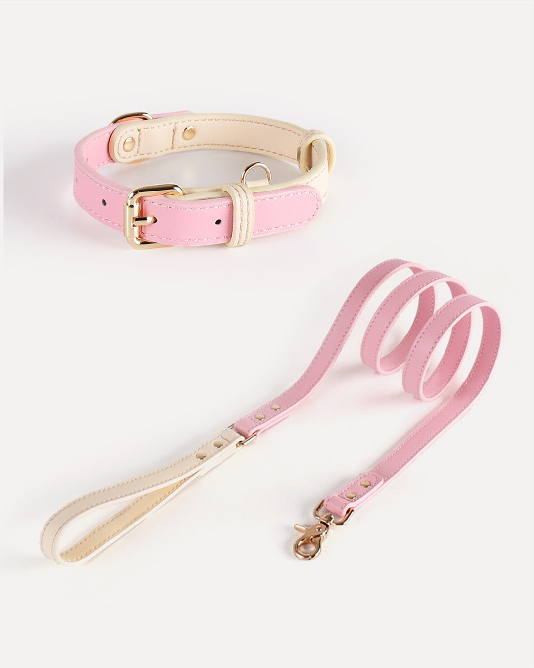 Eco-friendly two-tone dog kit in pink, featuring a genuine leather collar and leash.