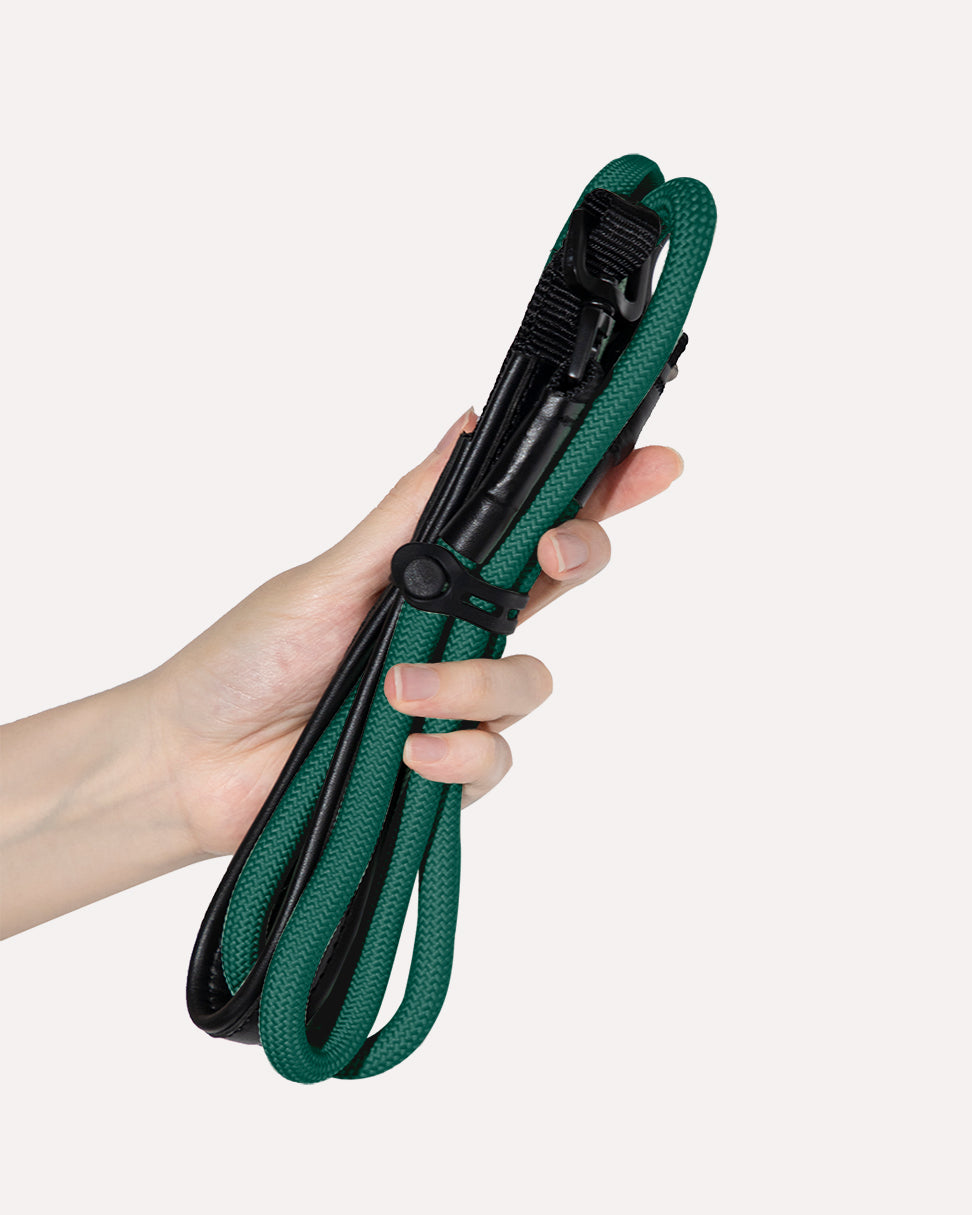 Heavy duty dog slip lead in dark green, showcasing the retracted design for compact storage.