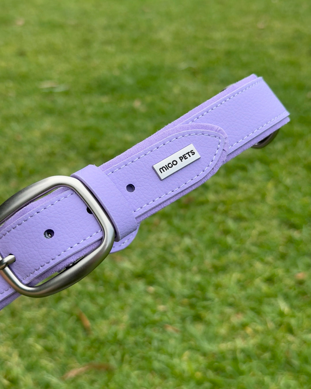MIGO PETS branding on waterproof AirTag dog collar made from vegan leather.