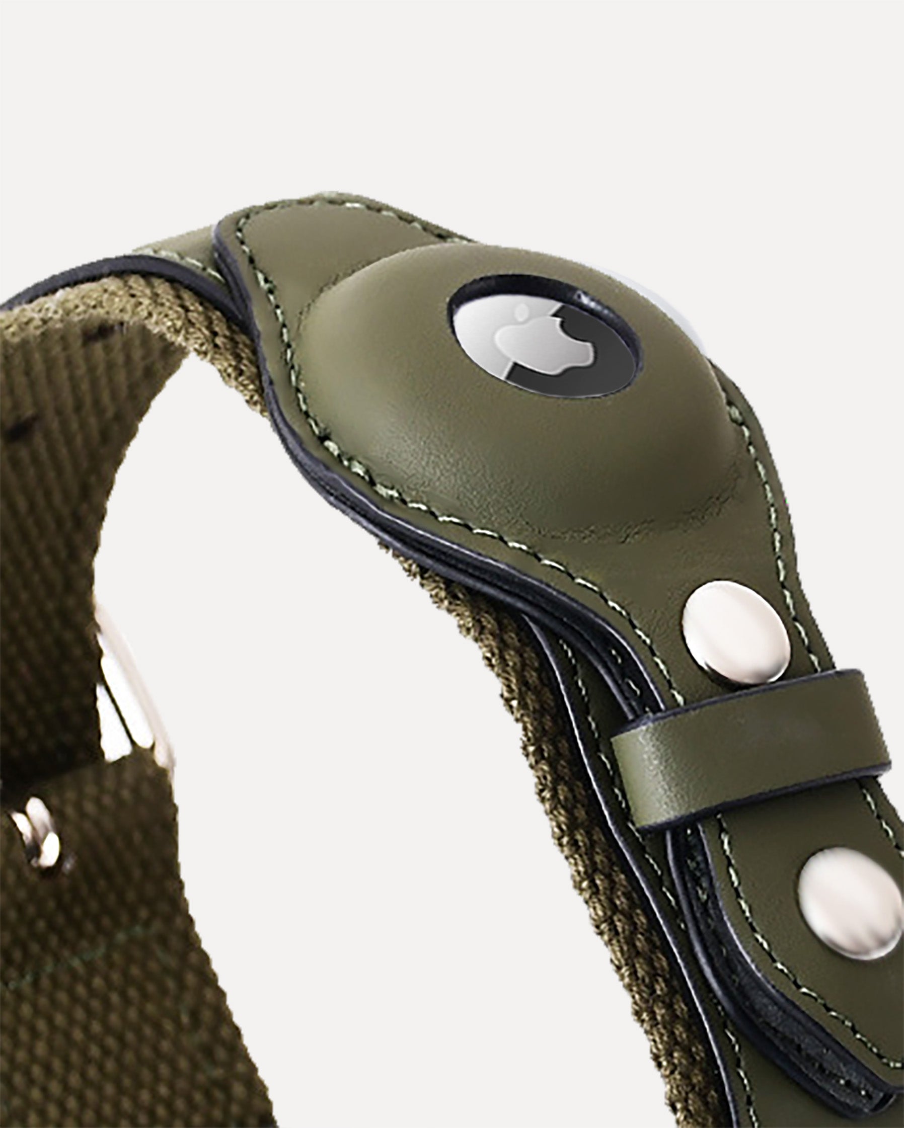 Close-up of the moss green airtag dog collar, featuring a secure, exposed slot for optimal airtag fit and signal transmission.