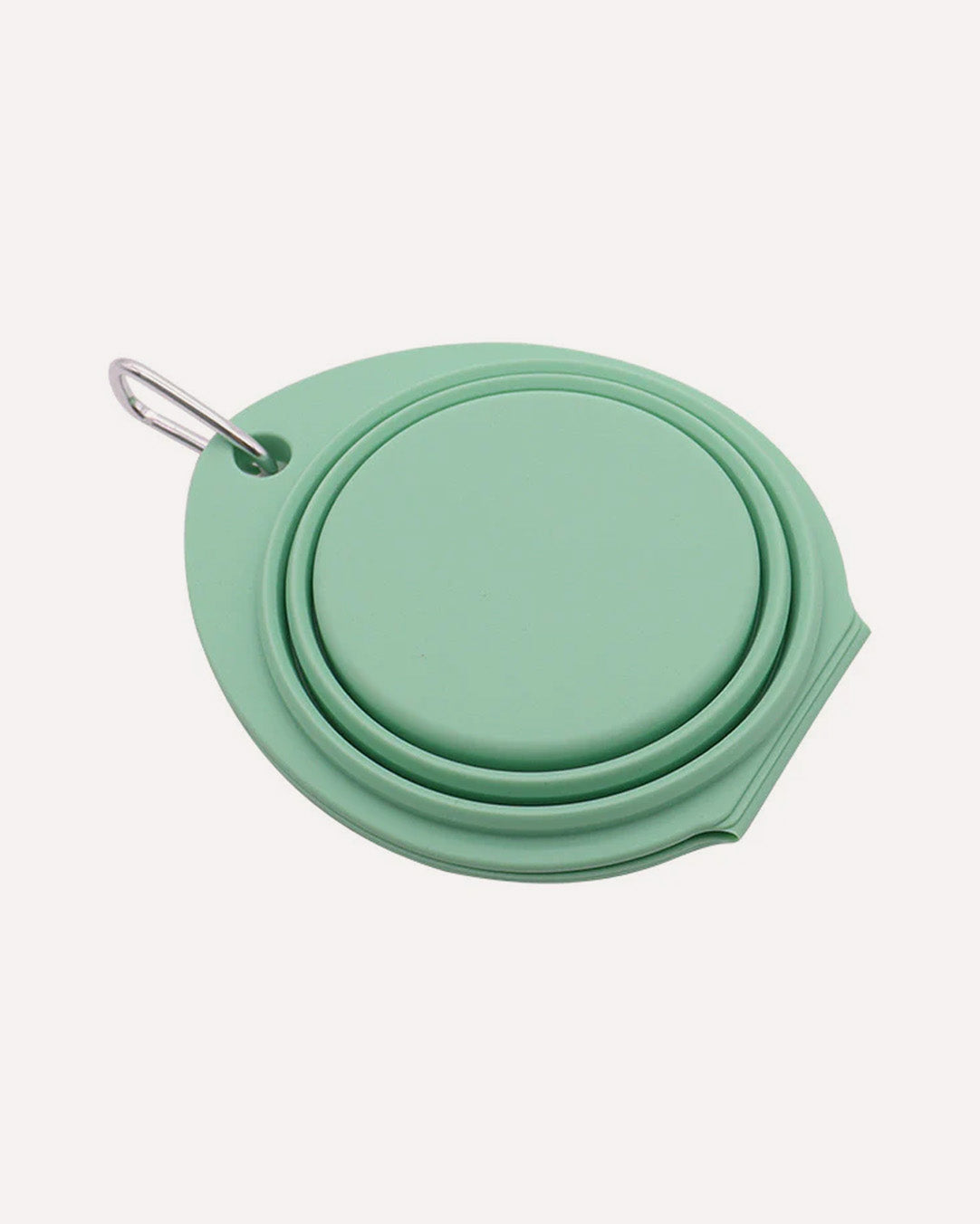 Folded collapsible travel double dog bowl in cyan, featuring a compact design.