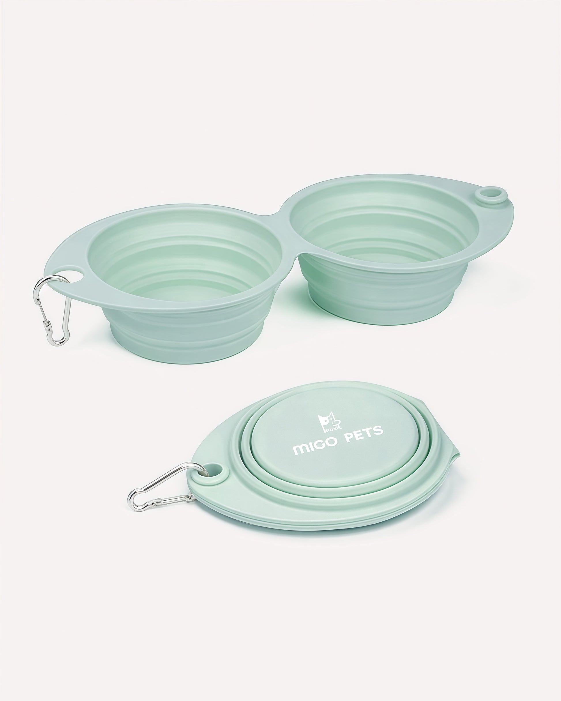 Overview of the collapsible travel double dog bowl in light spring dew, featuring its complete design.