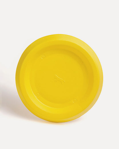 Overview of the soft floating and easy-to-clean dog frisbee in yellow, featuring its complete design.